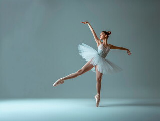 prima ballerina against a gray gradient background, exquisite dance, ballet dancer on one toe