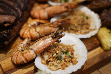 Delicious well-cooked shrimp and grilled scallops