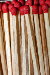 Boxed matches, red heads, group. Ready for fire, Embers possibility.