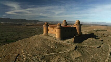Aerial View of a Desert Castle, Ancient Fortress on a Desert Hilltop, Solitary Castle in the Vast...