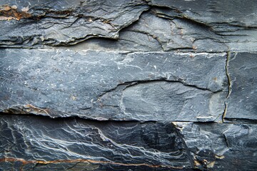 Dark grey black slate background or texture. Black stone surface with cracks.