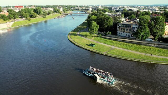 Vistula River, Wisla Seen From The Air In Cracow, Krakow, Poland, Polska. Flyover of Wisla Vistula River near the city centre of Crakow modern and historic architecture
