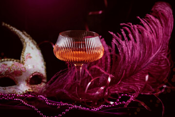 Masquerade ball holiday background with sparkling wine