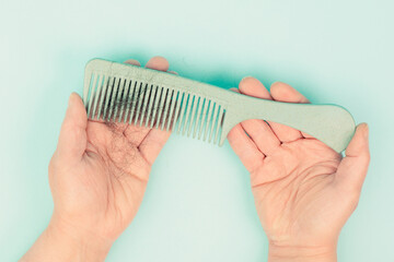 Comb with hair loss, health problem, issue of aging, alopecia areata by stress or infection, hairbrush - 788647397