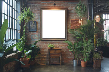 Urban loft space with lush greenery and blank canvas on brick wall, industrial charm meets nature. Vintage decor and natural light create serene ambience