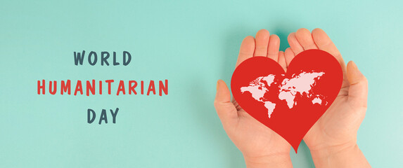 Red heart with world map, humanitarian help day, charity, support and volunteering concept - 788658301