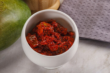 Spicy pickled raw green mango