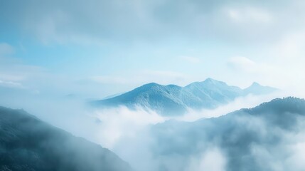 Mountain peaks through the fog