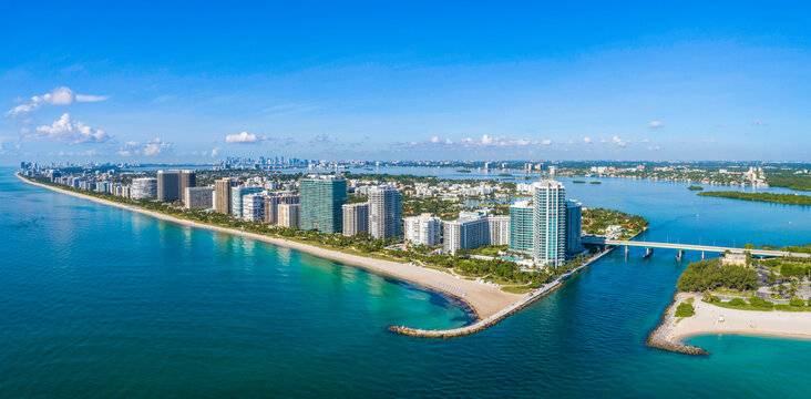 Aerial view of urban cityscape with skyscrapers near Haulover Inlet, Bal Harbour, Florida, United States.