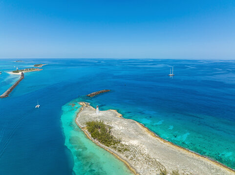 Aerial view of turquoise waters and sandy beaches at Nassau Harbour Lighthouse, Paradise Island, The Bahamas.