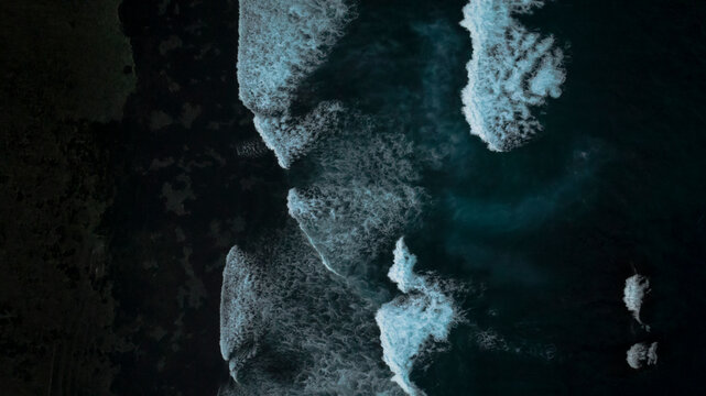 Aerial view of dark ocean waves, Badung, Bali, Indonesia.