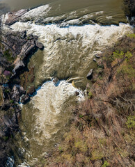 Aerial vertical view of Valley Falls State Park near Fairmont in West Virginia on a spring day with redbud blossoms