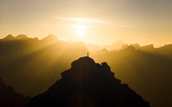 Aerial drone view of sunrise from the top of Pizes de Cir, Cirspitzen in The Dolomites, Italy.