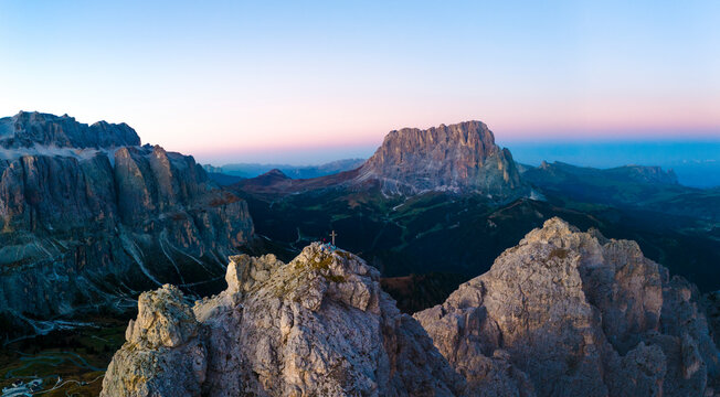 Aerial drone view of sunrise from the top of Pizes de Cir, Cirspitzen in The Dolomites, Italy.