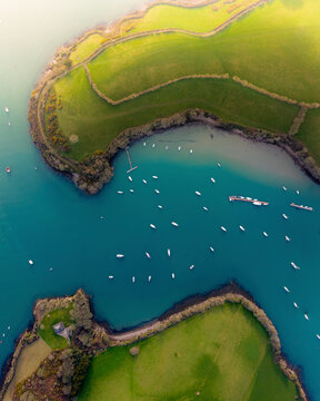 Aerial view of Salcombe Harbour with Snapes Point and White boats, Kingsbridge Estuary, England.