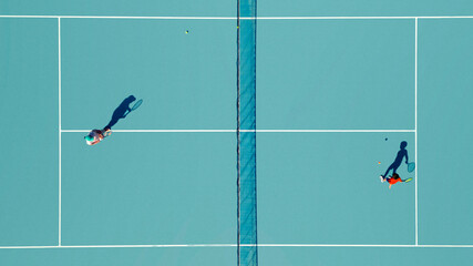 Aerial view of tennis court with persons, Podstrana - Miljevac, Split-Dalmatia, Croatia.