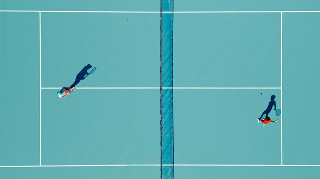 Aerial view of tennis court with persons, Podstrana - Miljevac, Split-Dalmatia, Croatia.