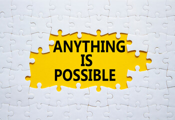 Anything is Possible symbol. White puzzle with words Anything is Possible. Beautiful yellow...
