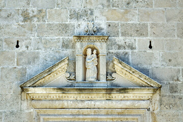 Decor above the portal of the church on the island of Our Lady of the Rocks (Perast, Montenegro)