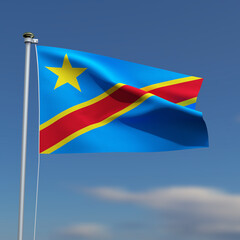 Congo Flag is waving in front of a blue sky with blurred clouds in the background