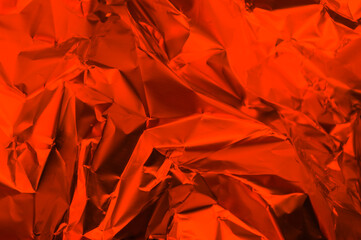 Textura o fondo de papel de aluminio rojo