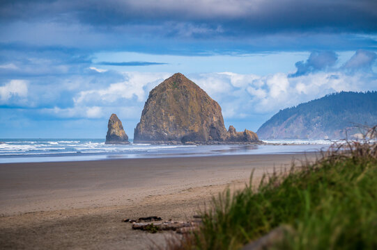 Haystack Rock is a 235 ft-tall sea stack in Cannon Beach, Oregon.  Haystack Rock is one of Oregon&rsquo;s most recognizable landmarks, home to colorful tidepools and diverse birdlife. 