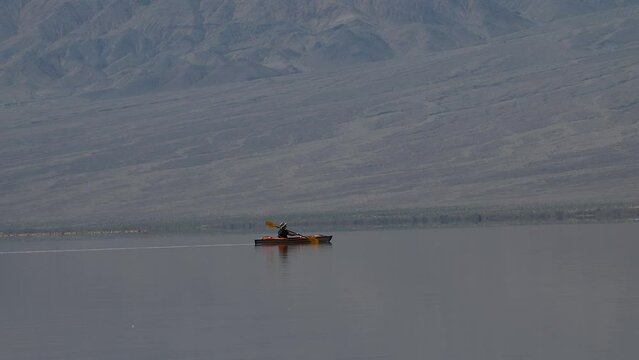 Idyllic Moment - Rowing peacefully on Lake Manly of Death Valley National Park.