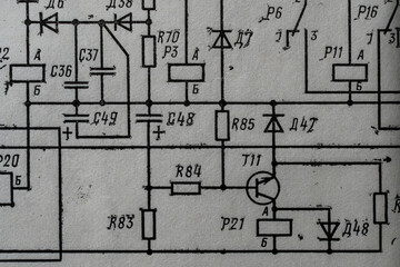 Old radio circuit printed on vintage paper electricity diagram as background. Electric radio scheme from USSR - 788711721