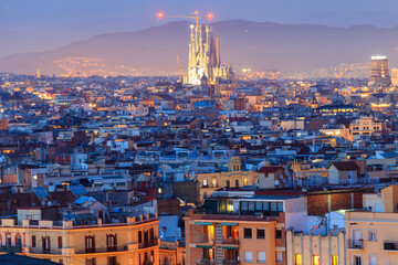 The skyline of Barcelona with the famous Sagrada Familia at night, Spain
