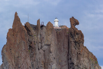 Strombolicchio rock. Lighthouse placed on the top of volcanic rock in 1 nautical mile to the...