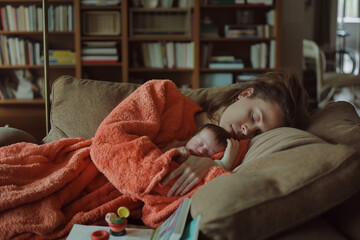 Mother and newborn napping on couch, depicting rest during postpartum period. Design for healthcare, parenting guide