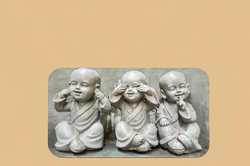 Three figurine children, does not see, does not hear, does not speak.