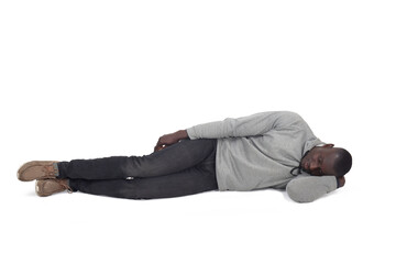 front view of a man lying on the floor on white background