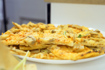 Close Up of Pizza on Cutting Board