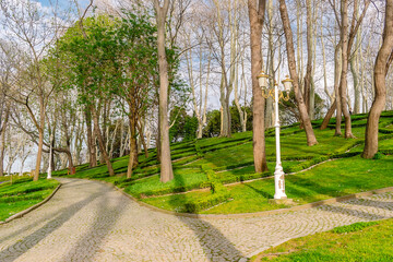 Gulhane Park Water screen in Istanbul. Paths, trees and flower beds in a park in Istanbul.