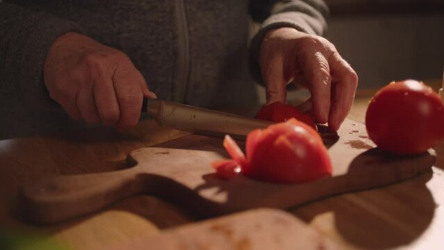 Eating strawberries, washing and preparing vegetables in the kitchen