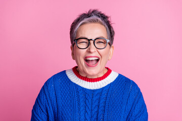 Photo of nice aged lady open mouth unbelievable wear blue sweater isolated on pink color background