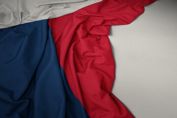 waving national flag of czech republic on a gray background.