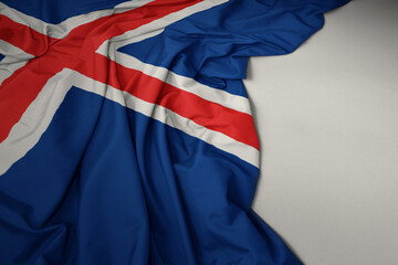 waving national flag of iceland on a gray background.