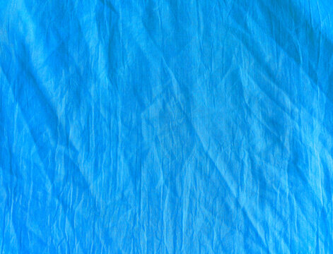 beautiful natural crumpled cotton textile background. suitable for designs and art projects