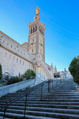 View of Notre Dame de la Garde on top of hill in Marseille. Basilica of Our Lady of Guard with...