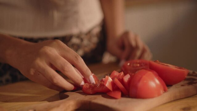 Eating strawberries, washing and preparing vegetables in the kitchen