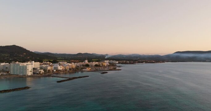 drone aerial from the city of calla millor at Mallorca at sunrise