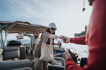 Helpful boatman giving a hand to a stylish woman getting off a leisure boat on a sunny day - obrazy, fototapety, plakaty
