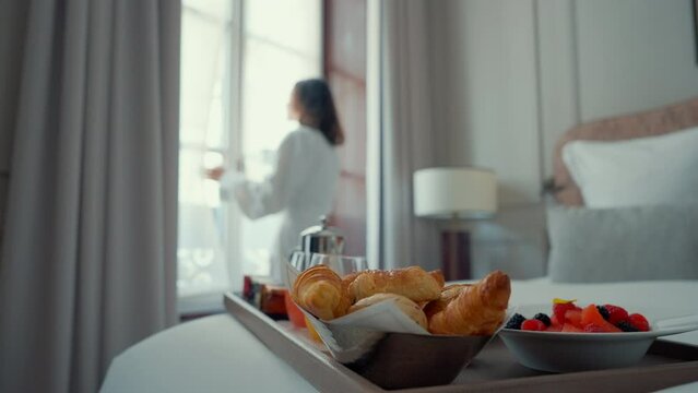 Breakfast Tray and Woman by Hotel Window