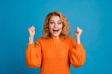 Photo of lovely cheerful woman wear stylish orange clothes win lottery jackpot isolated on blue...