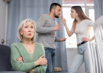 Offended elderly mother dont speaking with adult children during home quarrel
