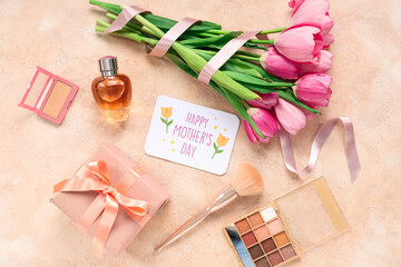 Greeting card with text HAPPY MOTHER'S DAY, beautiful tulips, makeup cosmetic products, gift box and bottle of perfume on beige background - obrazy, fototapety, plakaty