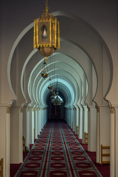 Tranquil archway corridor in a Moroccan mosque