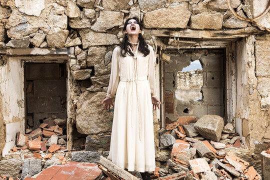 Woman Shouting in a Ruined Building